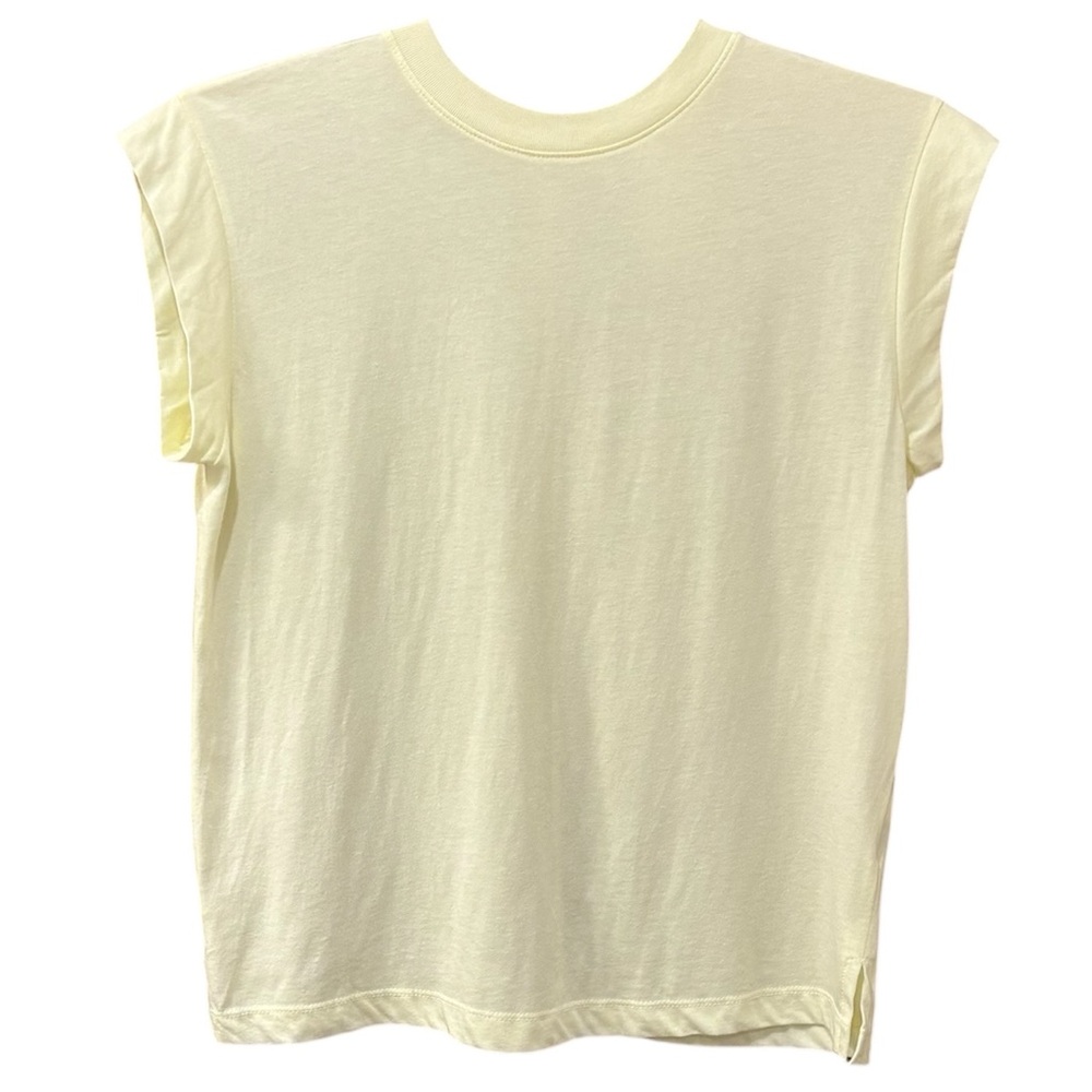 Pale yellow cap sleeve muscle tee, relaxed fit. XS
